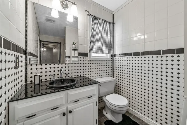 a view of a park with large trees