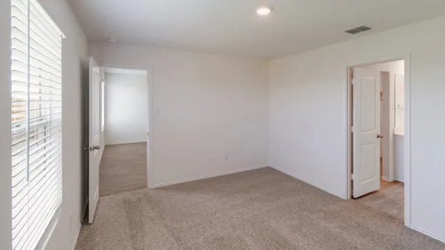 an empty room with windows