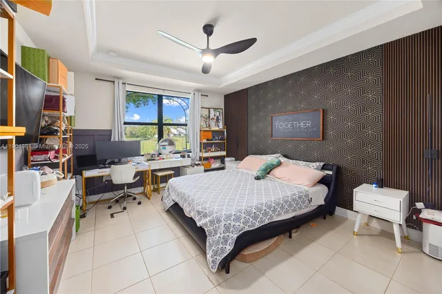 a bed room with a bed and a couch