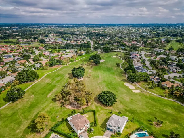 an aerial view of a city with houses