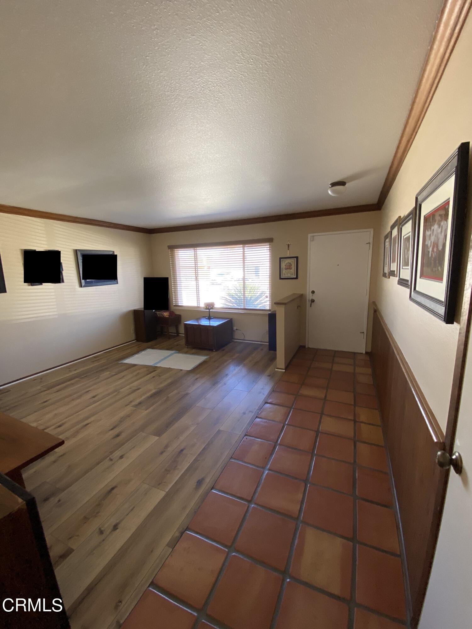 3470 Taffrail Lane Oxnard, CA 93035 - Photo 3 of 15 a view of an empty room with a window