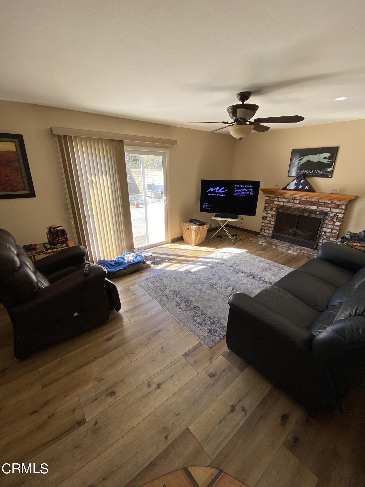 3470 Taffrail Lane Oxnard, CA 93035 - Photo 7 of 15 a living room with furniture and a wooden floor