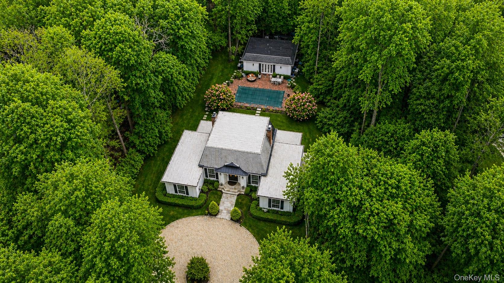 704 Short Beach Road Nissequogue, NY 11780 - Photo 2 of 25 an aerial view of a house with a yard