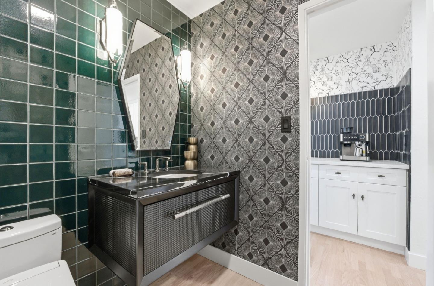 1003 Rosa Avenue Sunnyvale, CA 94086 - Photo 22 of 60 a bathroom with a sink toilet and shower