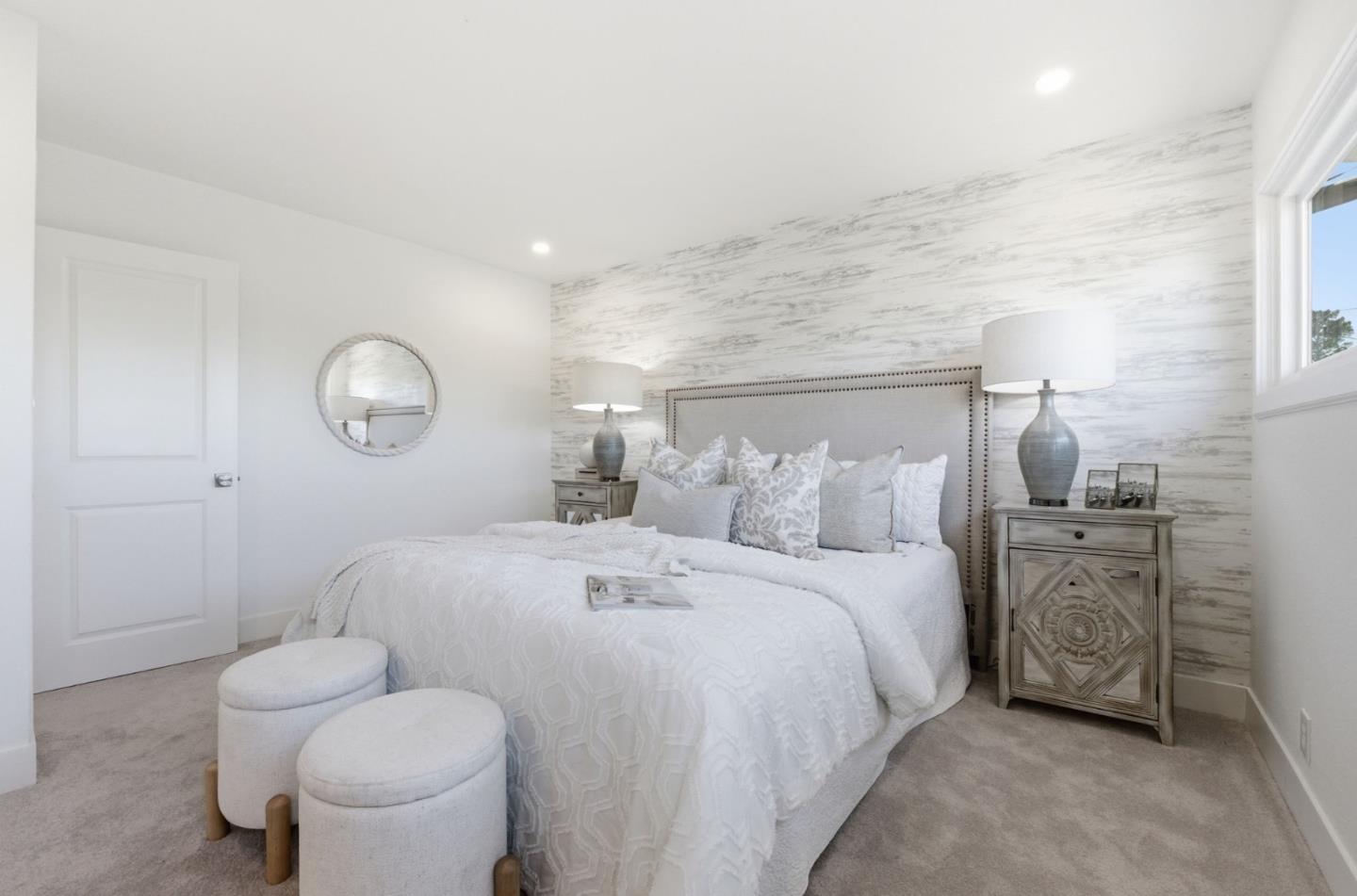1003 Rosa Avenue Sunnyvale, CA 94086 - Photo 36 of 60 a bedroom with a bed and a chandelier