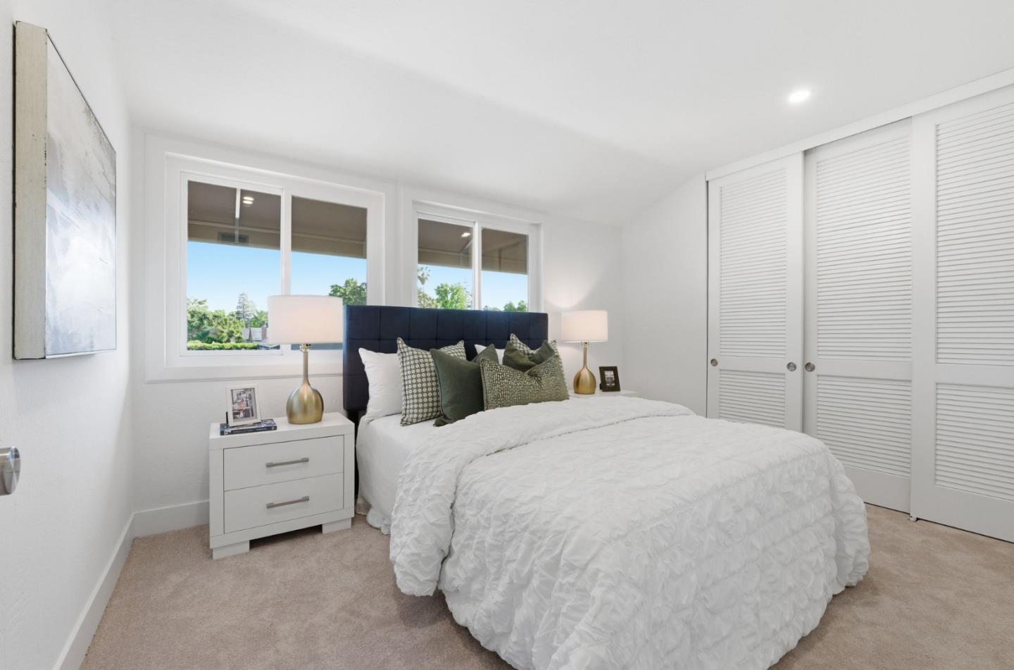 1003 Rosa Avenue Sunnyvale, CA 94086 - Photo 47 of 60 a bedroom with a bed and a night stand