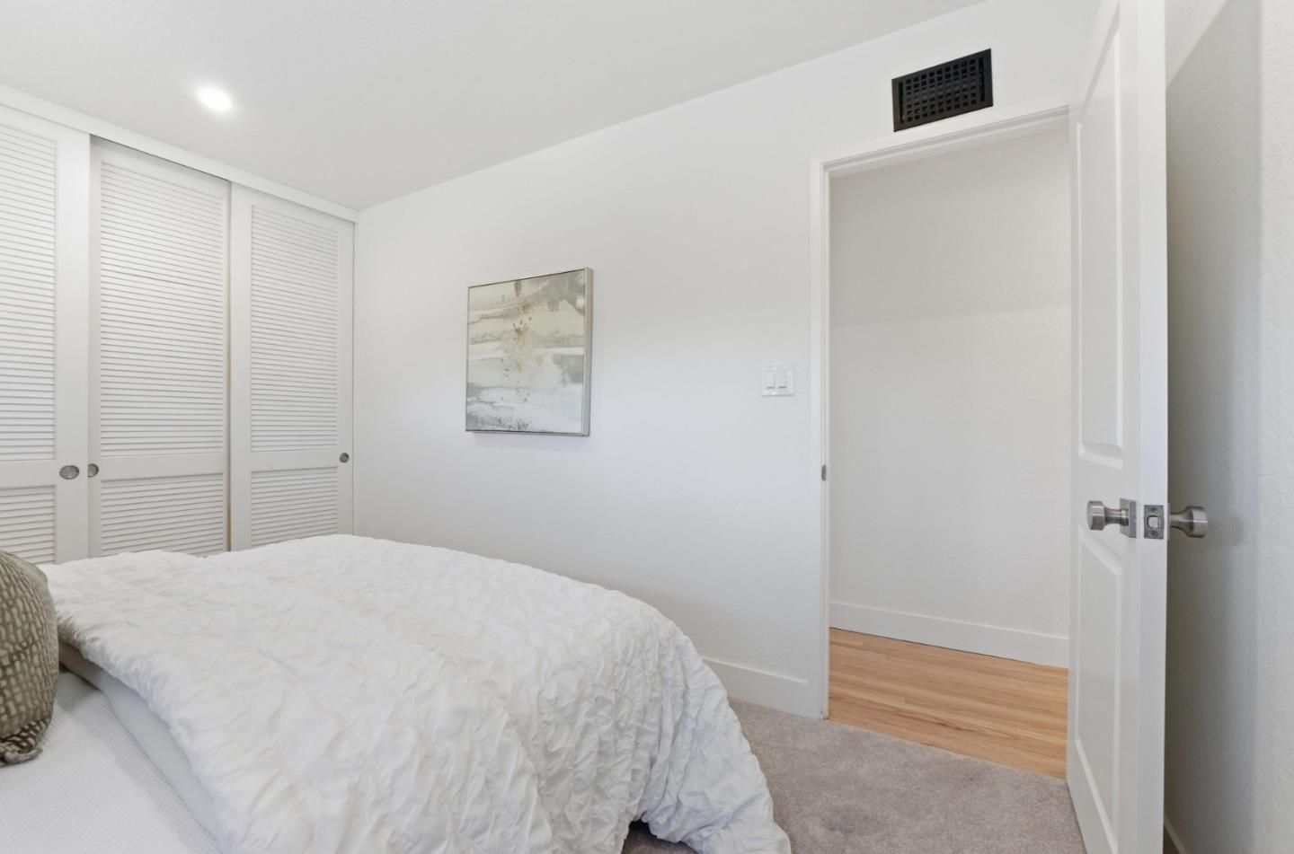 1003 Rosa Avenue Sunnyvale, CA 94086 - Photo 48 of 60 a bedroom with a bed and a walk in closet
