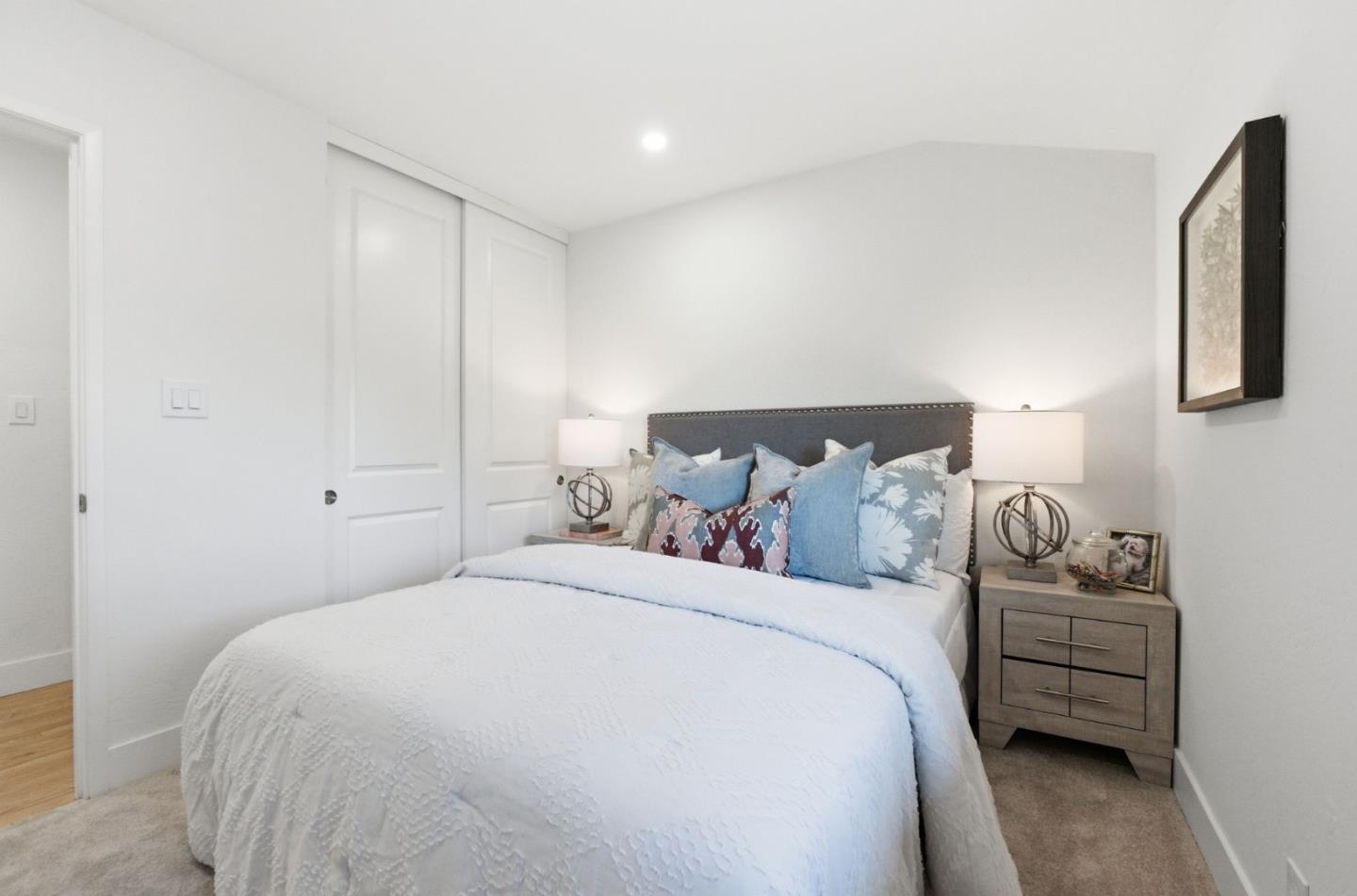 1003 Rosa Avenue Sunnyvale, CA 94086 - Photo 49 of 60 a bedroom with a bed and a couch