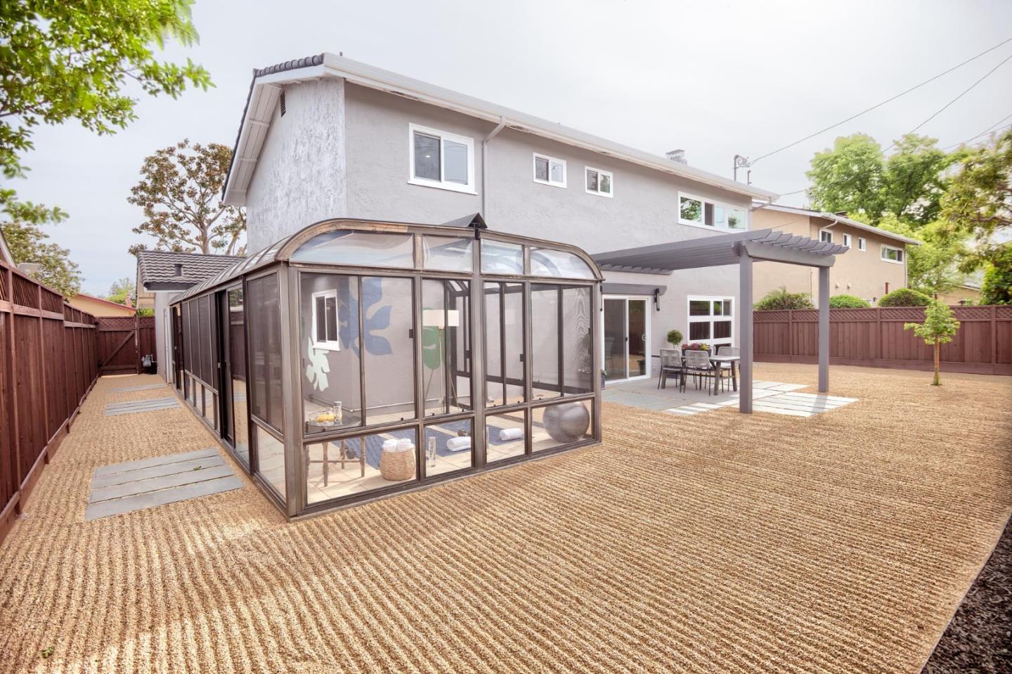 1003 Rosa Avenue Sunnyvale, CA 94086 - Photo 54 of 60 a white house with a large window and wooden floor