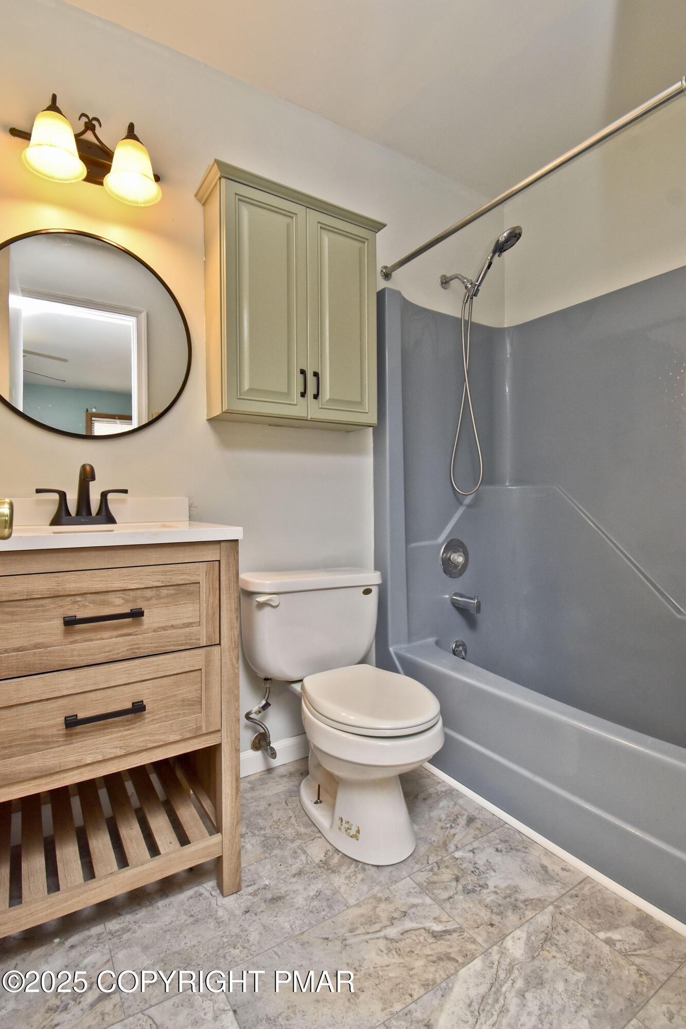 3282 Bluebird Drive Bushkill, PA 18324 - Photo 20 of 36 a bathroom with a sink toilet a mirror and shower
