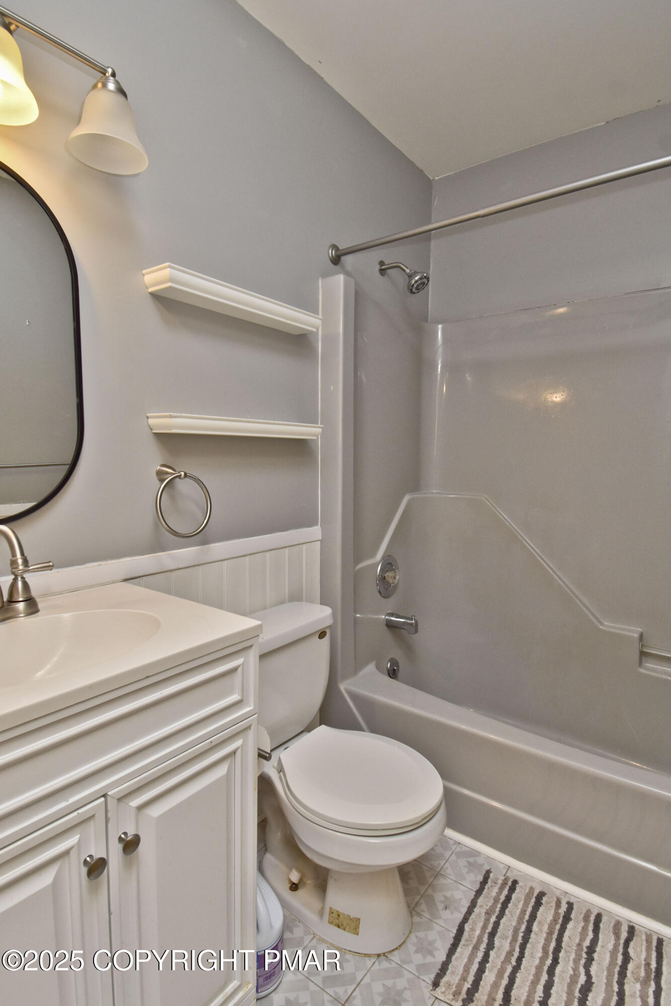 3282 Bluebird Drive Bushkill, PA 18324 - Photo 25 of 36 a bathroom with a toilet a sink and bathtub