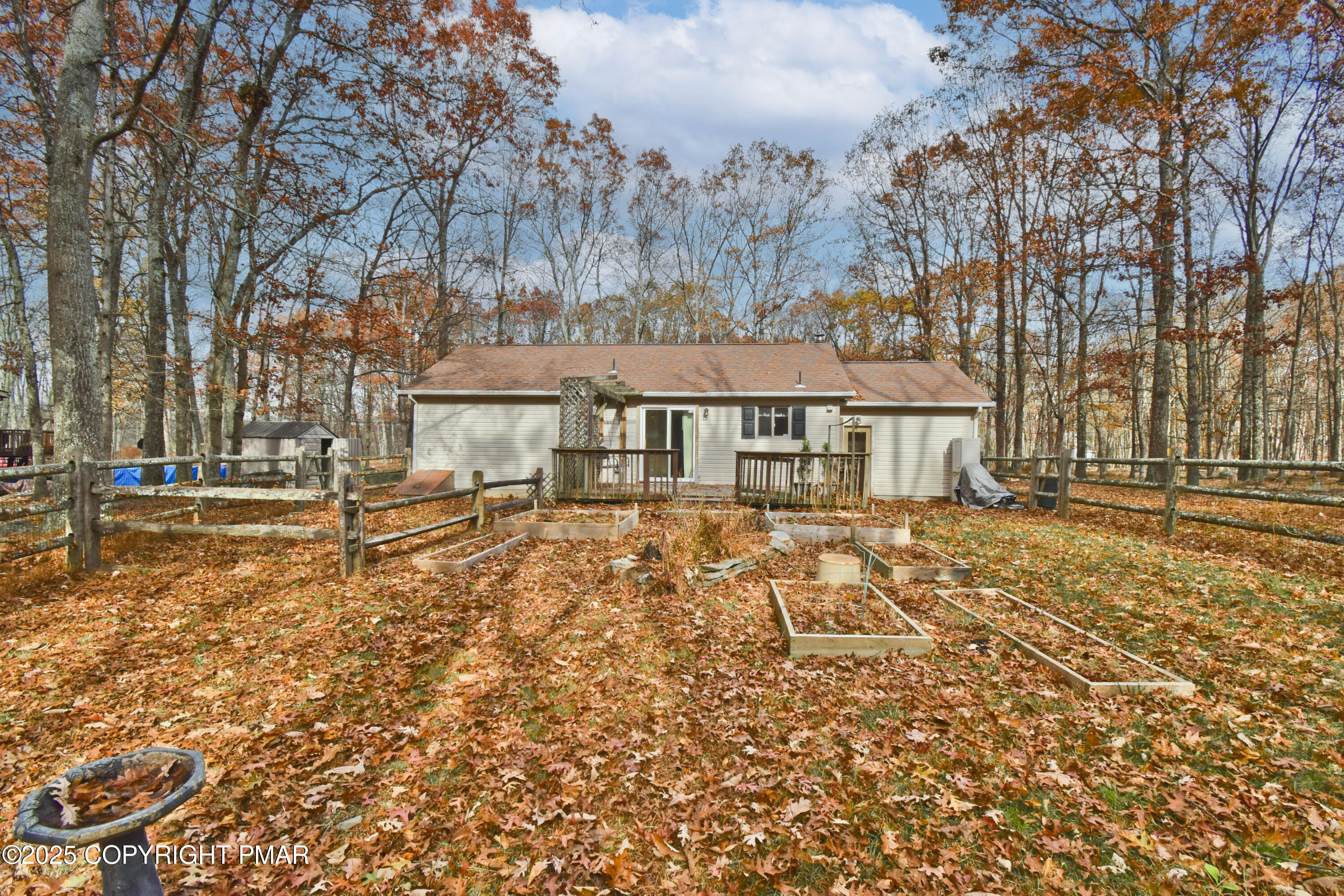 3282 Bluebird Drive Bushkill, PA 18324 - Photo 29 of 36 a front view of a house with a yard