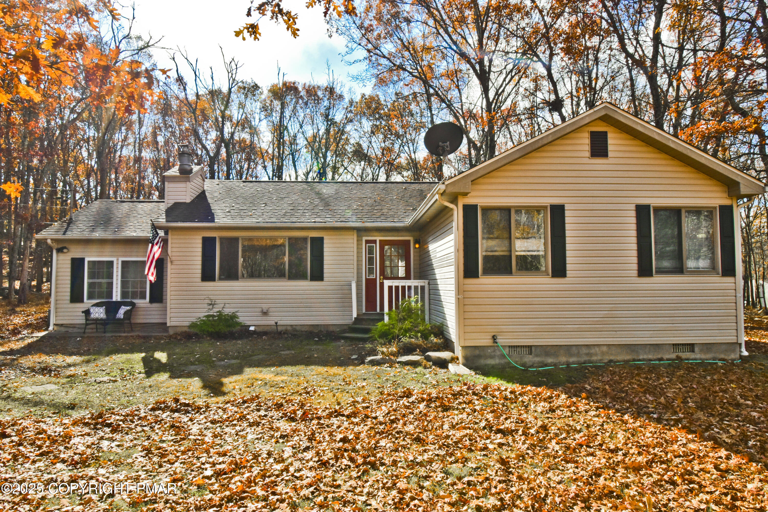 3282 Bluebird Drive Bushkill, PA 18324 - Photo 30 of 36 a front view of a house with a yard