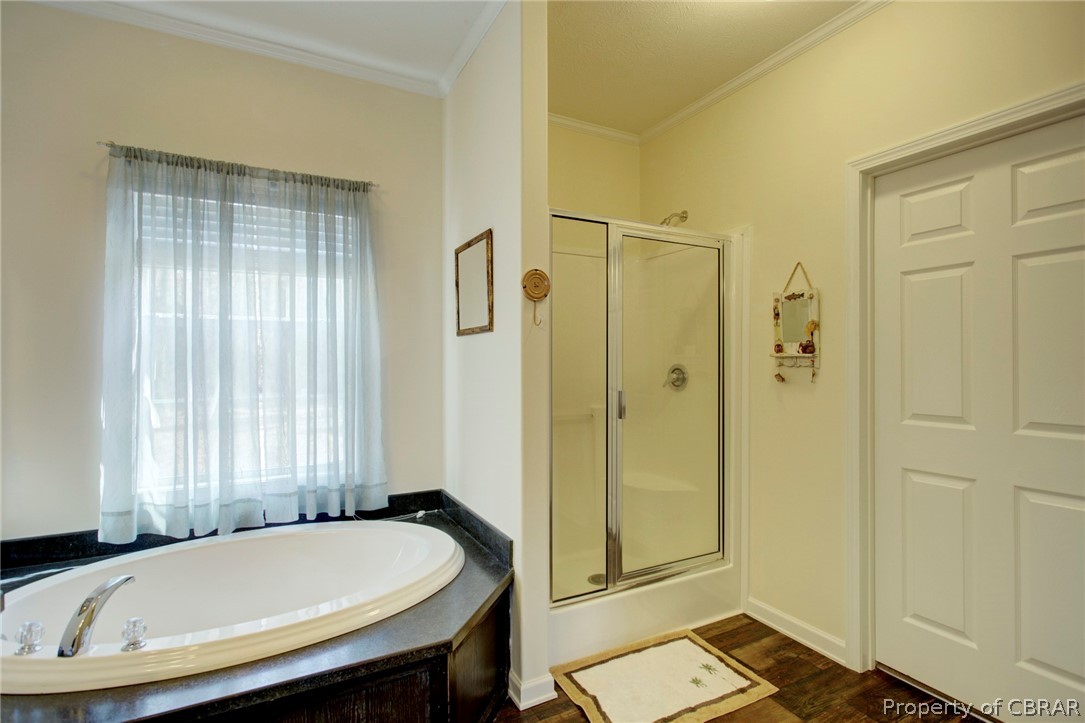1496 Elsom Mascot Road Mattaponi, VA 23110 - Photo 20 of 33 a bathroom with a granite countertop tub sink and mirror