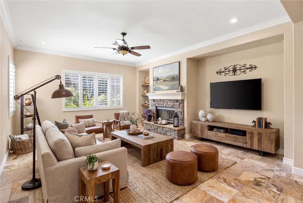 5810 Etiwanda Avenue Rancho Cucamonga, CA 91739 - Photo 12 of 68 a living room with furniture and a flat screen tv