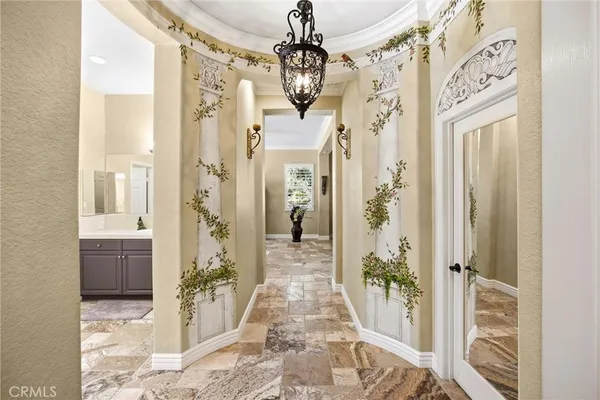 a bathroom with a bathtub sink and double vanity