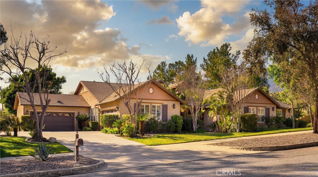 5810 Etiwanda Avenue Rancho Cucamonga, CA 91739 - Photo 3 of 68 a front view of a house with garden