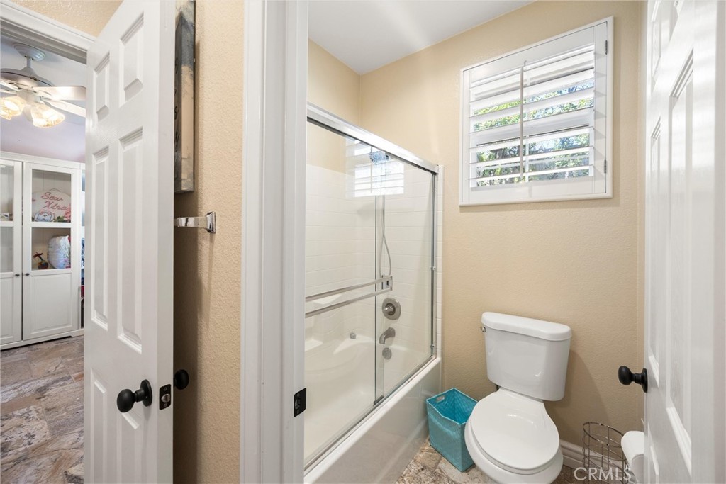 5810 Etiwanda Avenue Rancho Cucamonga, CA 91739 - Photo 34 of 68 a white toilet sitting next to a bathroom sink