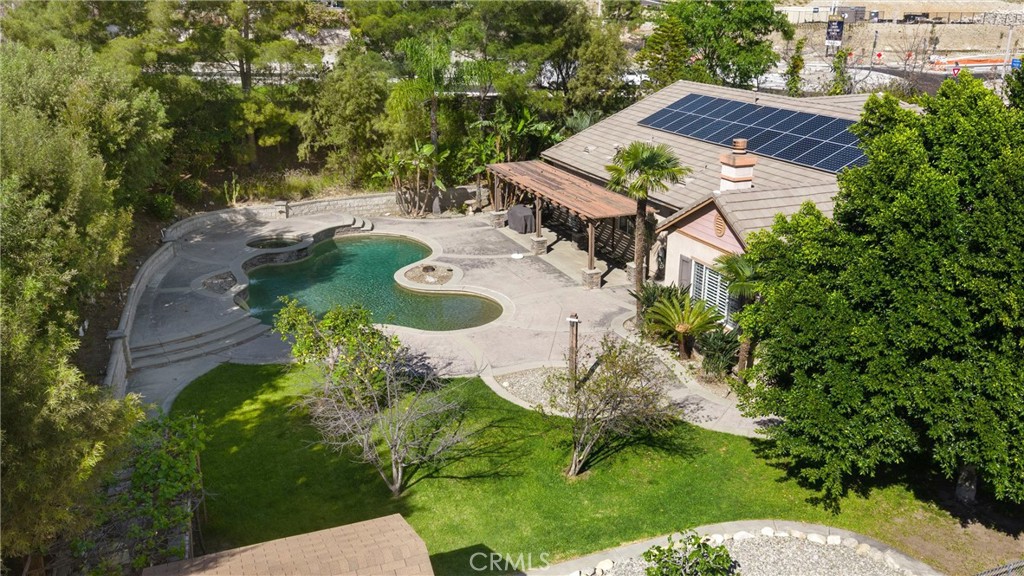 5810 Etiwanda Avenue Rancho Cucamonga, CA 91739 - Photo 62 of 68 an aerial view of a house with a yard