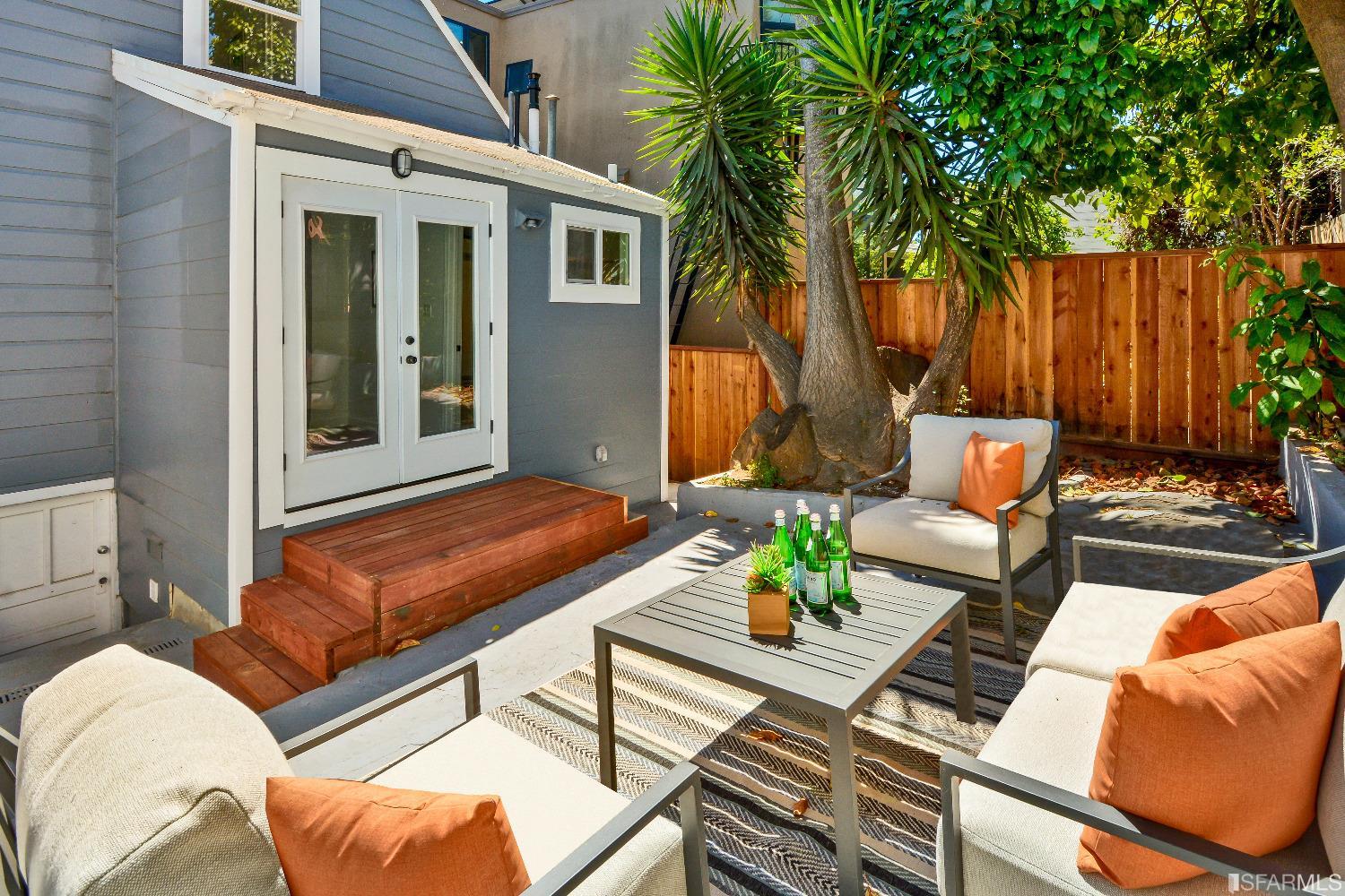 334 Holladay Avenue San Francisco, CA 94110 - Photo 28 of 36 a backyard of a house with seating space