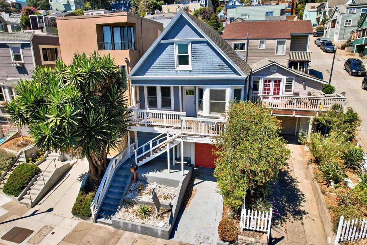 334 Holladay Avenue San Francisco, CA 94110 - Photo 30 of 36 a aerial view of a house with a yard and potted plants
