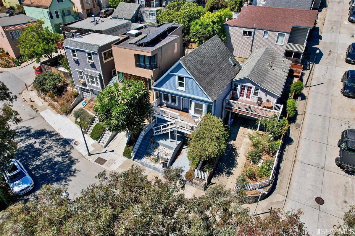 334 Holladay Avenue San Francisco, CA 94110 - Photo 34 of 36 an aerial view of multiple houses with a yard