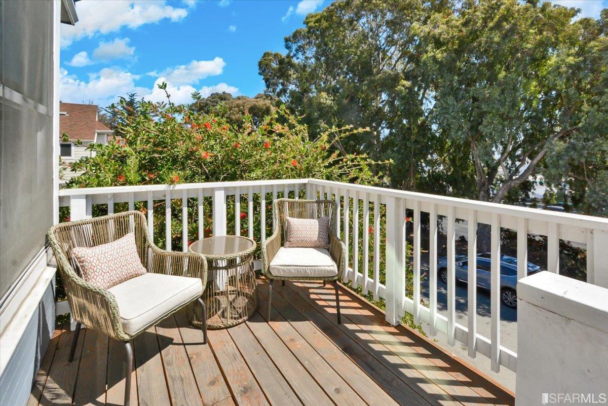 334 Holladay Avenue San Francisco, CA 94110 - Photo 5 of 36 a view of a balcony with wooden floor
