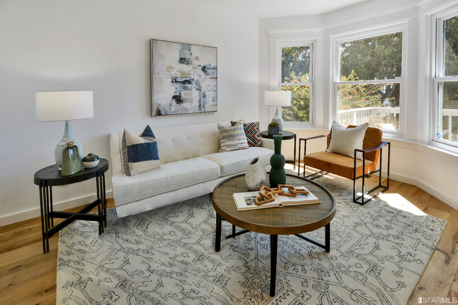 334 Holladay Avenue San Francisco, CA 94110 - Photo 6 of 36 a living room with furniture and a lamp