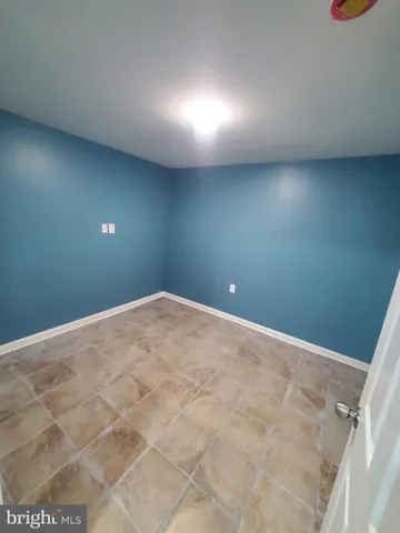 a bathroom with a sink a toilet and bathtub