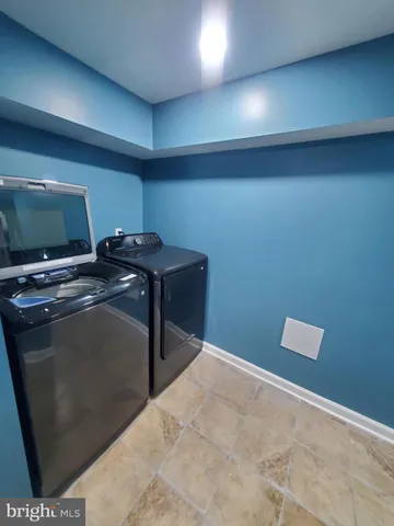 a view of entryway with a front door