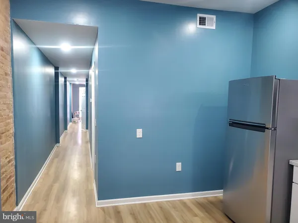 a view of hallway with stairs