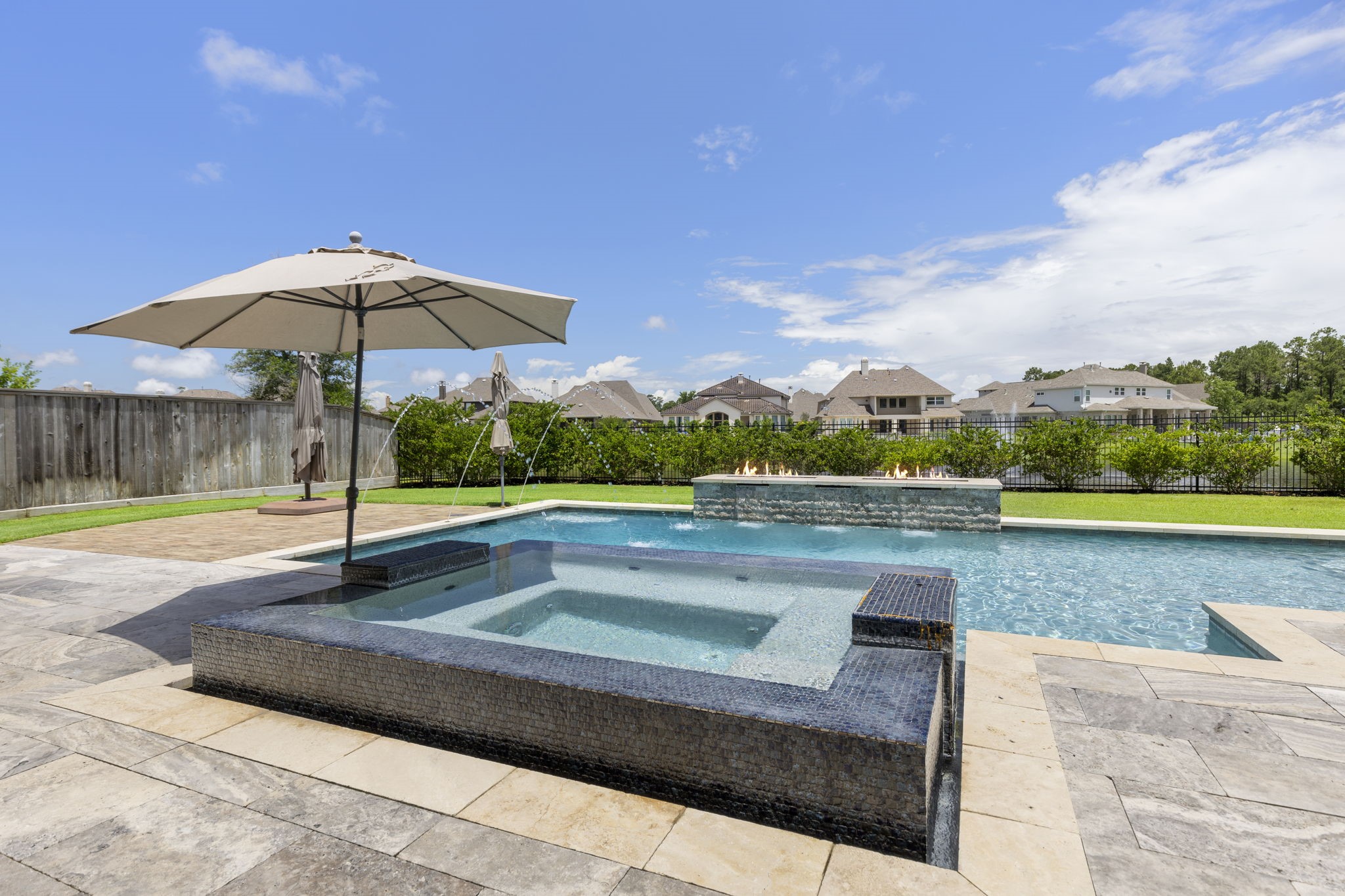 6806 West Warwick Lake Lane Spring, TX 77389 - Photo 47 of 50 a view of a swimming pool and a terrace