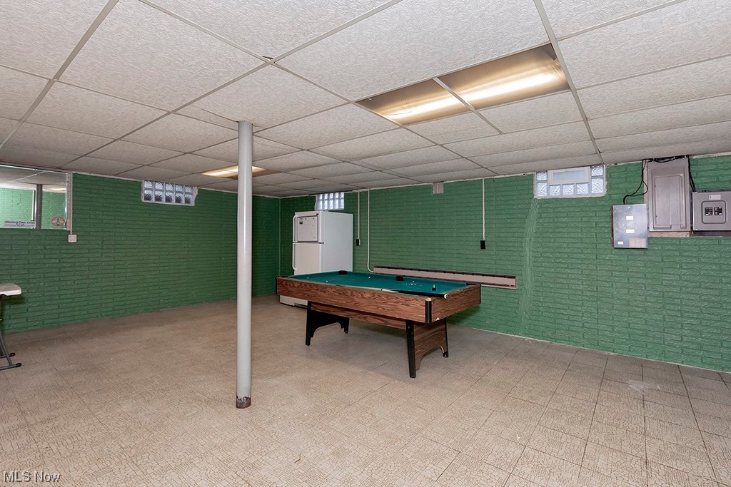 39102 Chestnut Ridge Road Elyria, OH 44035 - Photo 31 of 44 Recreation room featuring light tile floors, a paneled ceiling, and billiards