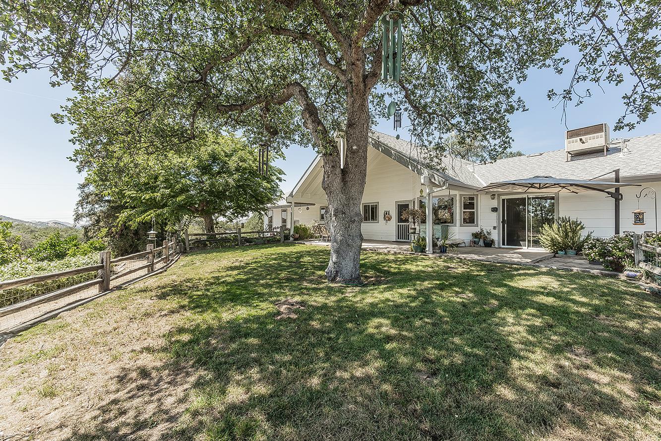 14815 Garlock Lane Prather, CA 93651 - Photo 37 of 80 a view of a house with a yard