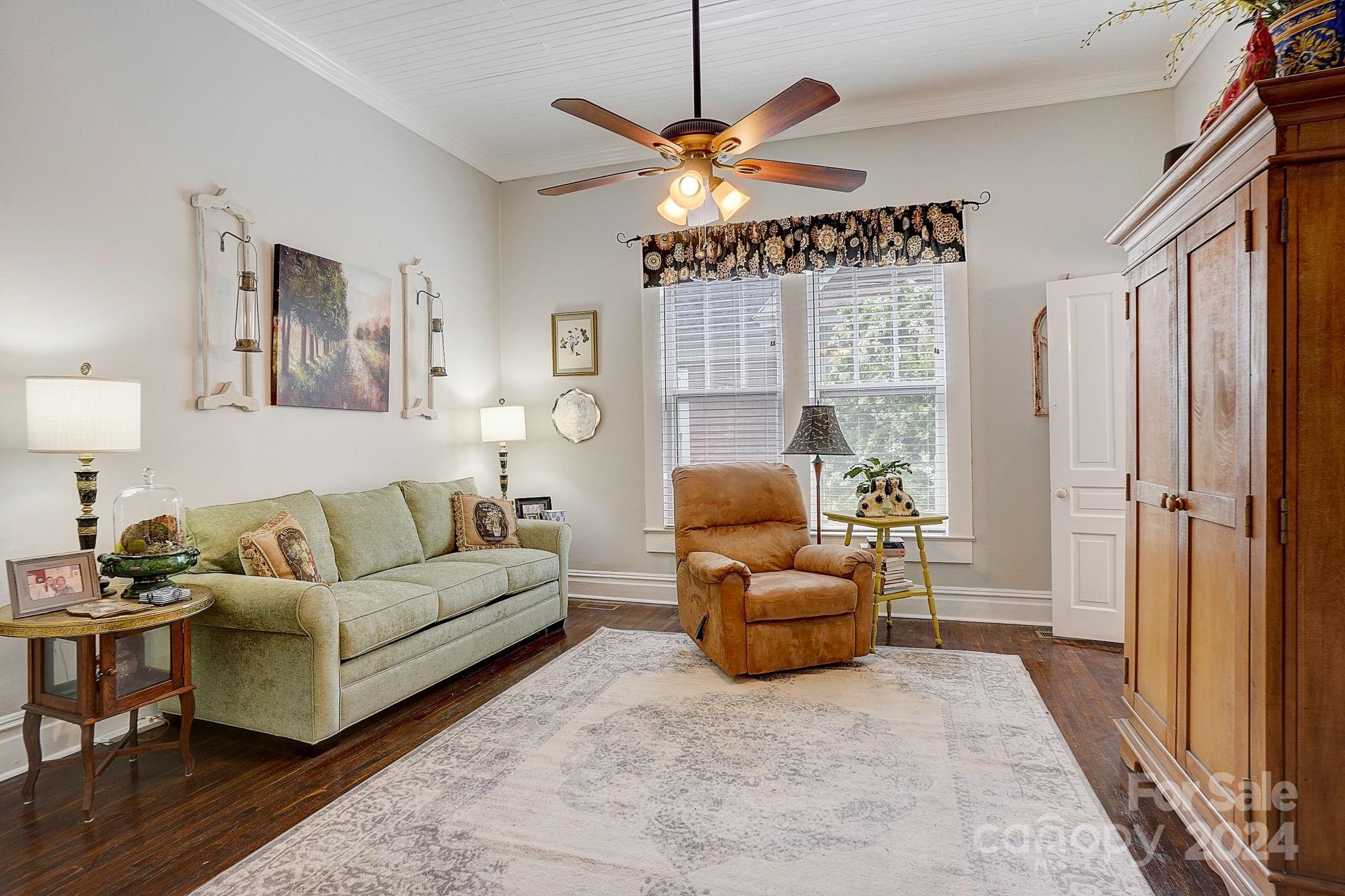 179 Union Street South Concord, NC 28025 - Photo 19 of 38 a living room with furniture and a large window