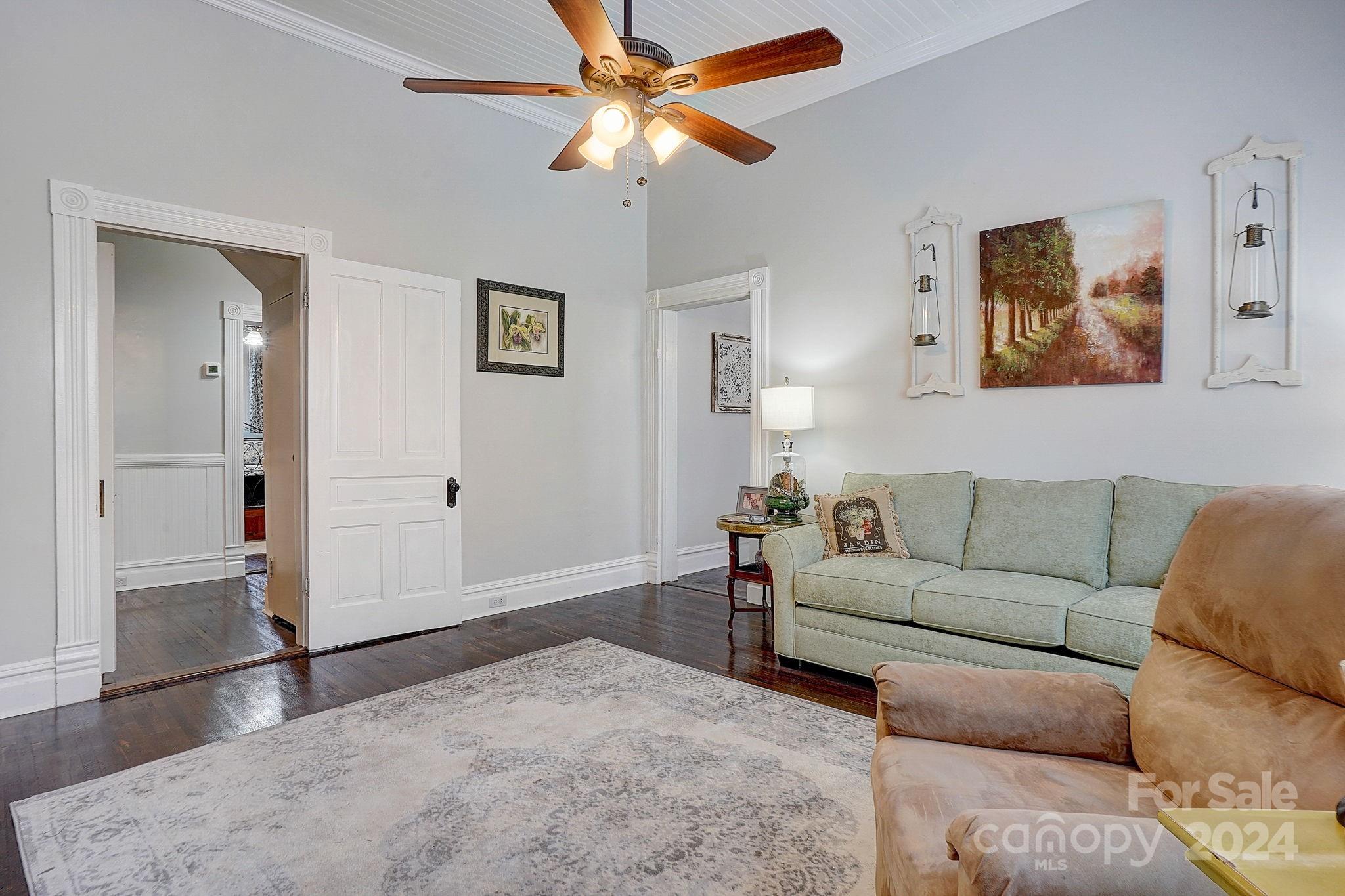 179 Union Street South Concord, NC 28025 - Photo 20 of 38 a living room with furniture and a flat screen tv