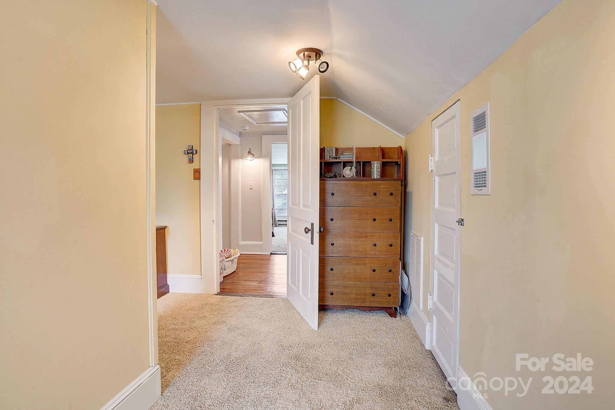 179 Union Street South Concord, NC 28025 - Photo 28 of 38 an empty room with closet and a bathroom