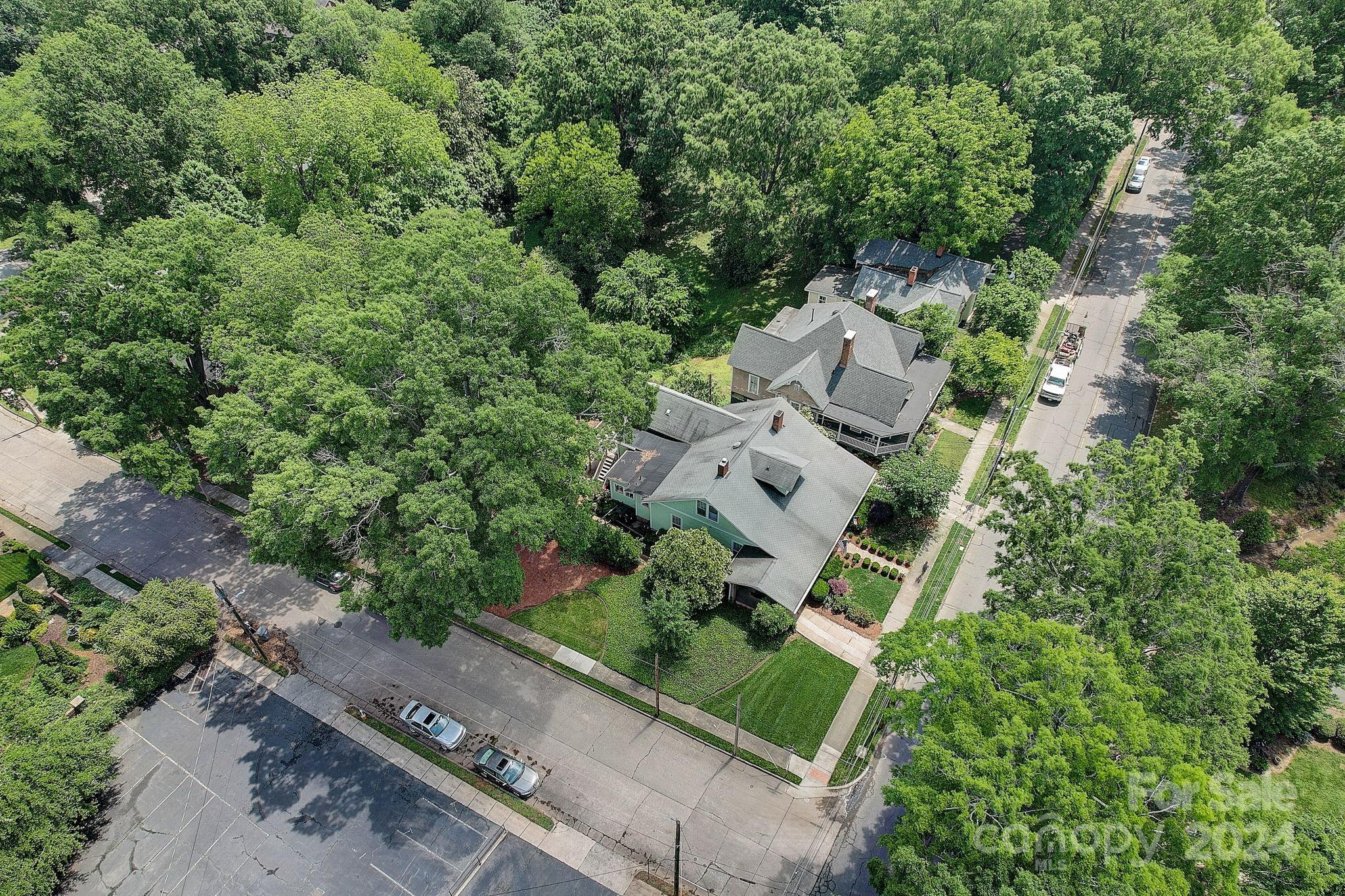 179 Union Street South Concord, NC 28025 - Photo 33 of 38 an aerial view of a house with outdoor space and street view