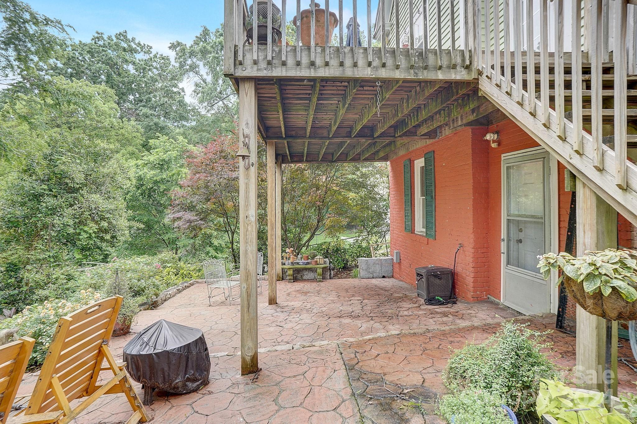 179 Union Street South Concord, NC 28025 - Photo 38 of 38 a backyard of a house with table and chairs