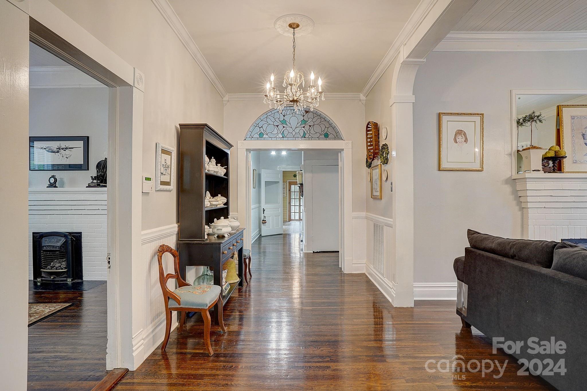 179 Union Street South Concord, NC 28025 - Photo 5 of 38 a view of a livingroom with furniture and wooden floor