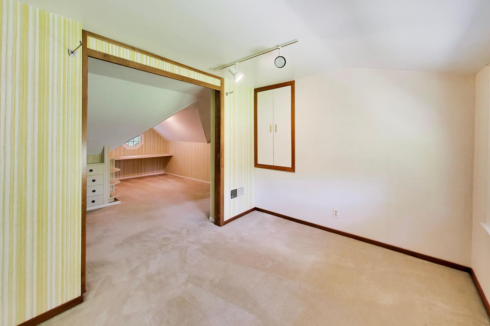 103 Cottonwood Road Northbrook, IL 60062 - Photo 29 of 50 a view of an empty room and a window