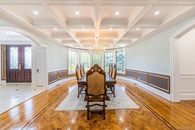 a kitchen with granite countertop a sink and cabinets
