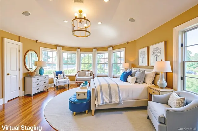a bedroom with bed and wooden floor