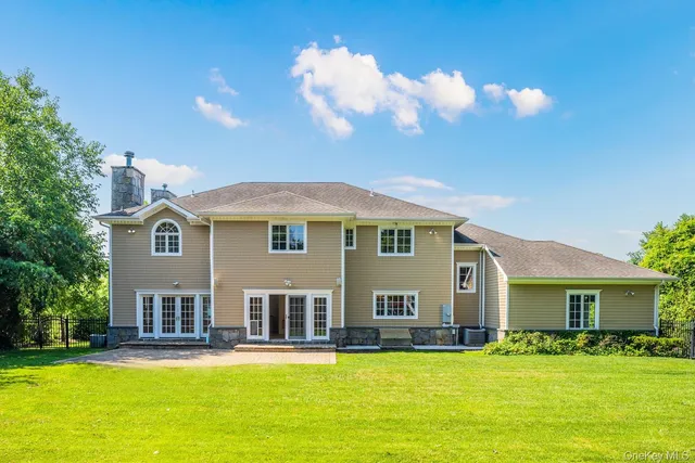 a view of a house with a swimming pool