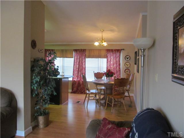 130 Dustin Lane Roxboro, NC 27574 - Photo 11 of 15 a view of a dining room with furniture window and wooden floor