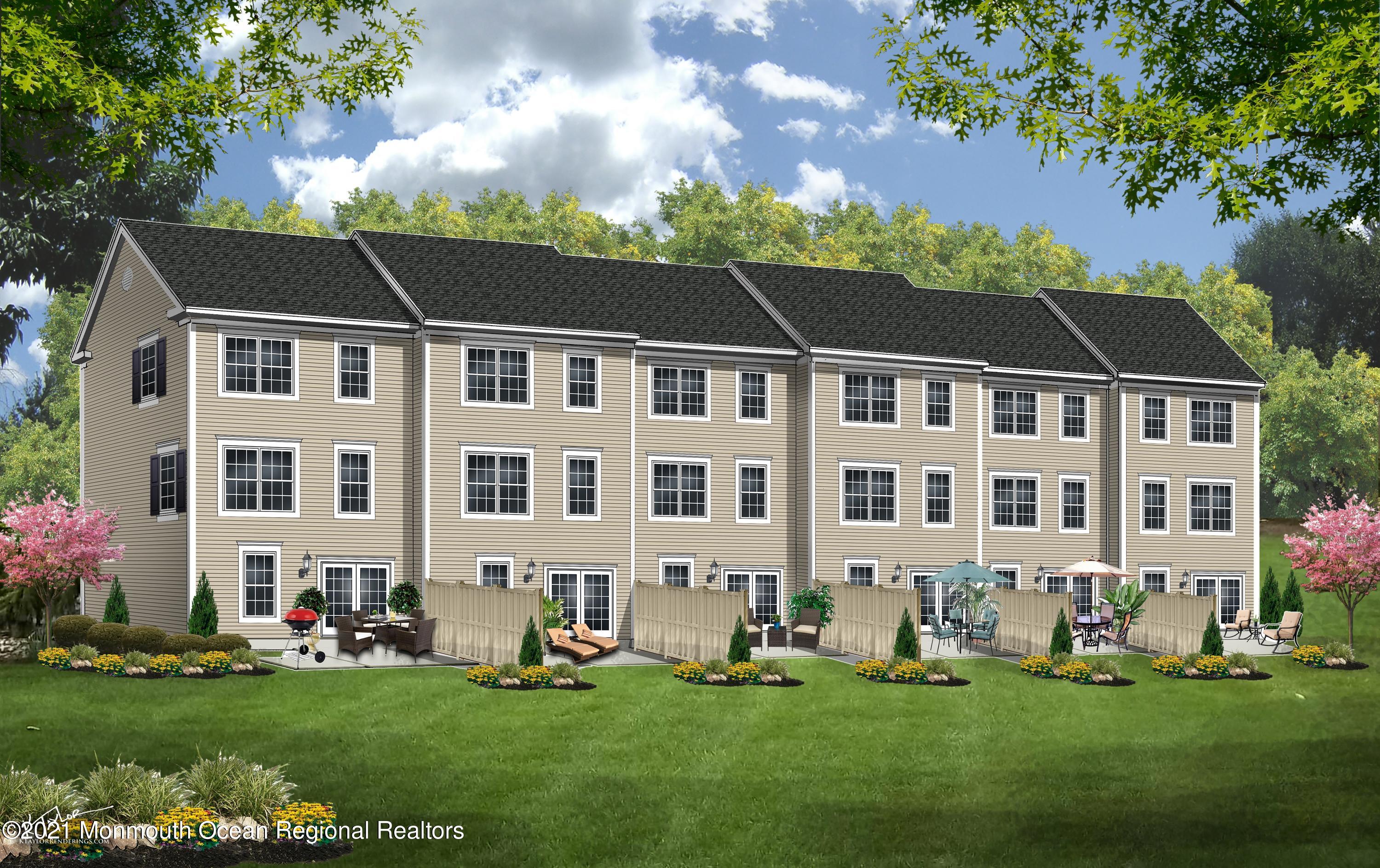 200 Prestige Road Brick, NJ 08723 - Photo 2 of 3 a front view of a house with a garden and plants