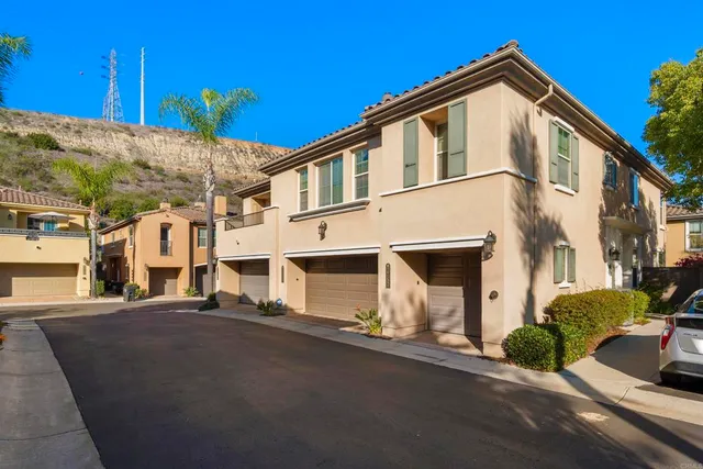 a front view of a house with a garage