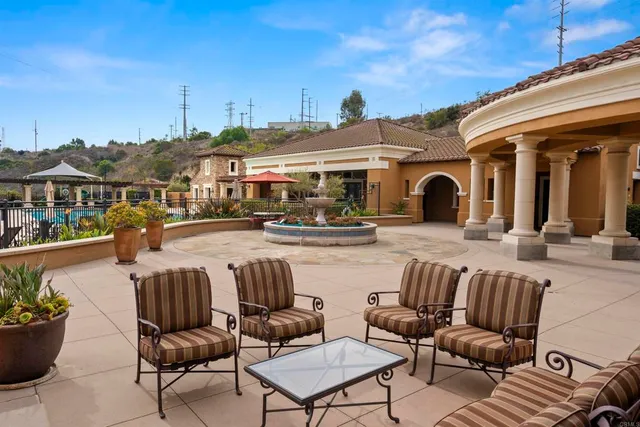 a view of building with outdoor space and seating area