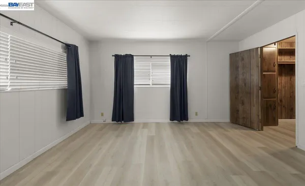 a bathroom with a double vanity sink toilet and shower