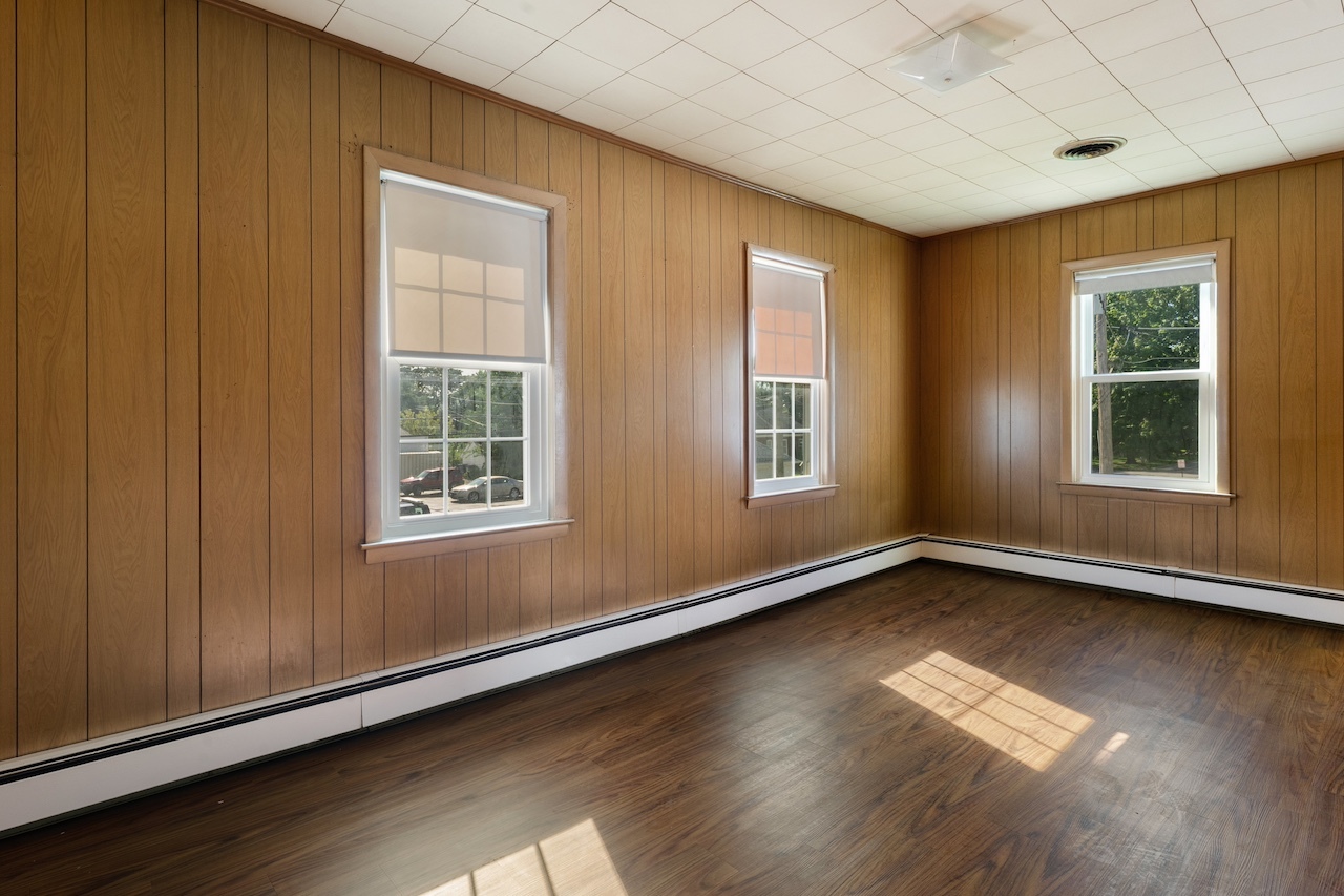 3701 216th Street Matteson, IL 60443 - Photo 19 of 26 an empty room with wooden floor and windows